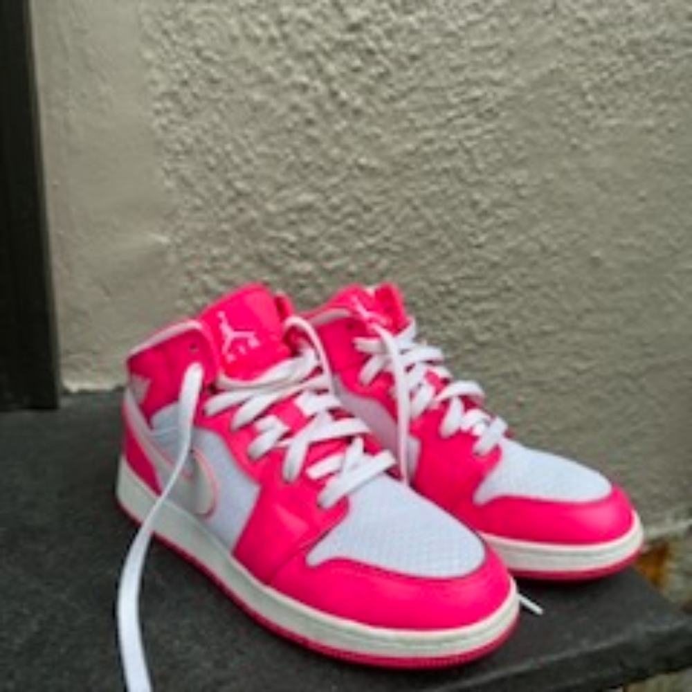 Women's hot pink Nike hightops